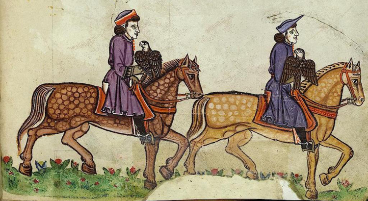 Two falconers on horseback and holding falcons on their arms as they canter across a field